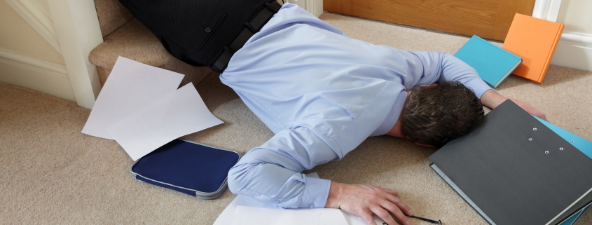 A business man who has fallen down a flight of stairs