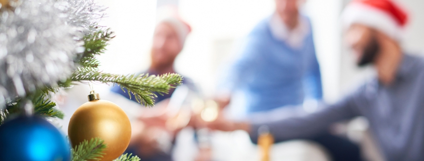 A Christmas tree and a holiday party