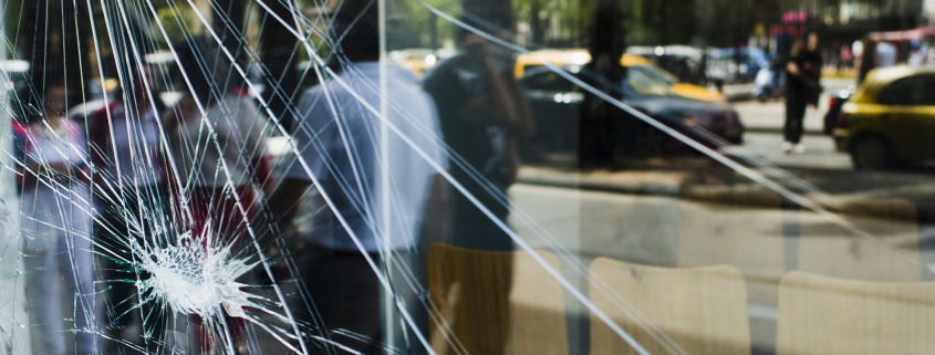 Close up of cracked storefront window in Hamilton