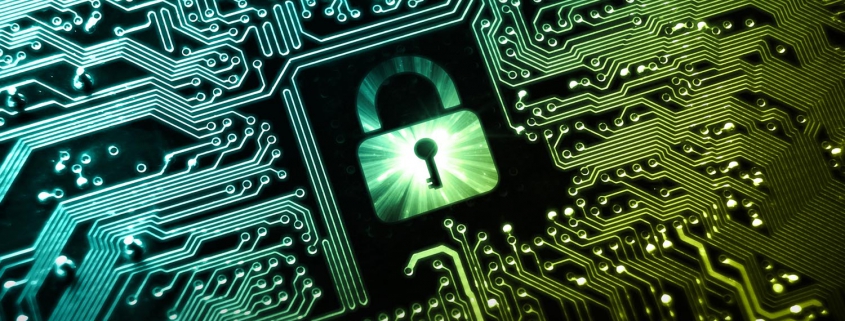Green digital padlock on green and black motherboard